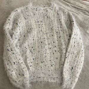 cakes and cashmere sweater